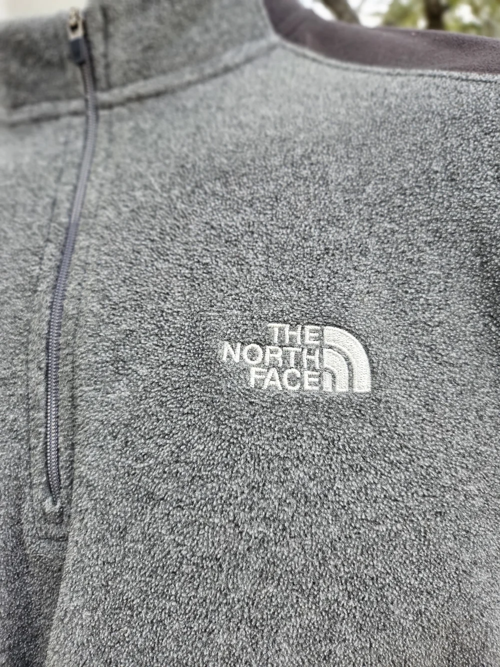 The North Face Men’s Charcoal and Black Half-Zip Fleece Pullover TKA 100 L Read